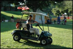 Elvis in a Golf Cart